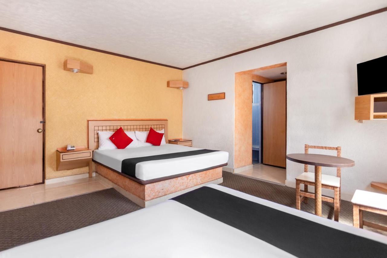 Capital O Hotel Valencia بويبلا المظهر الخارجي الصورة